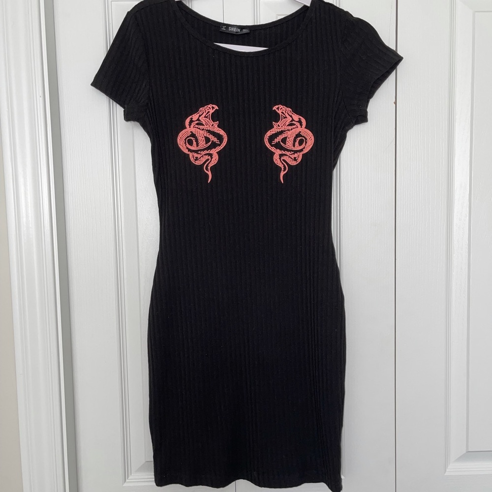 Tight black dress with design